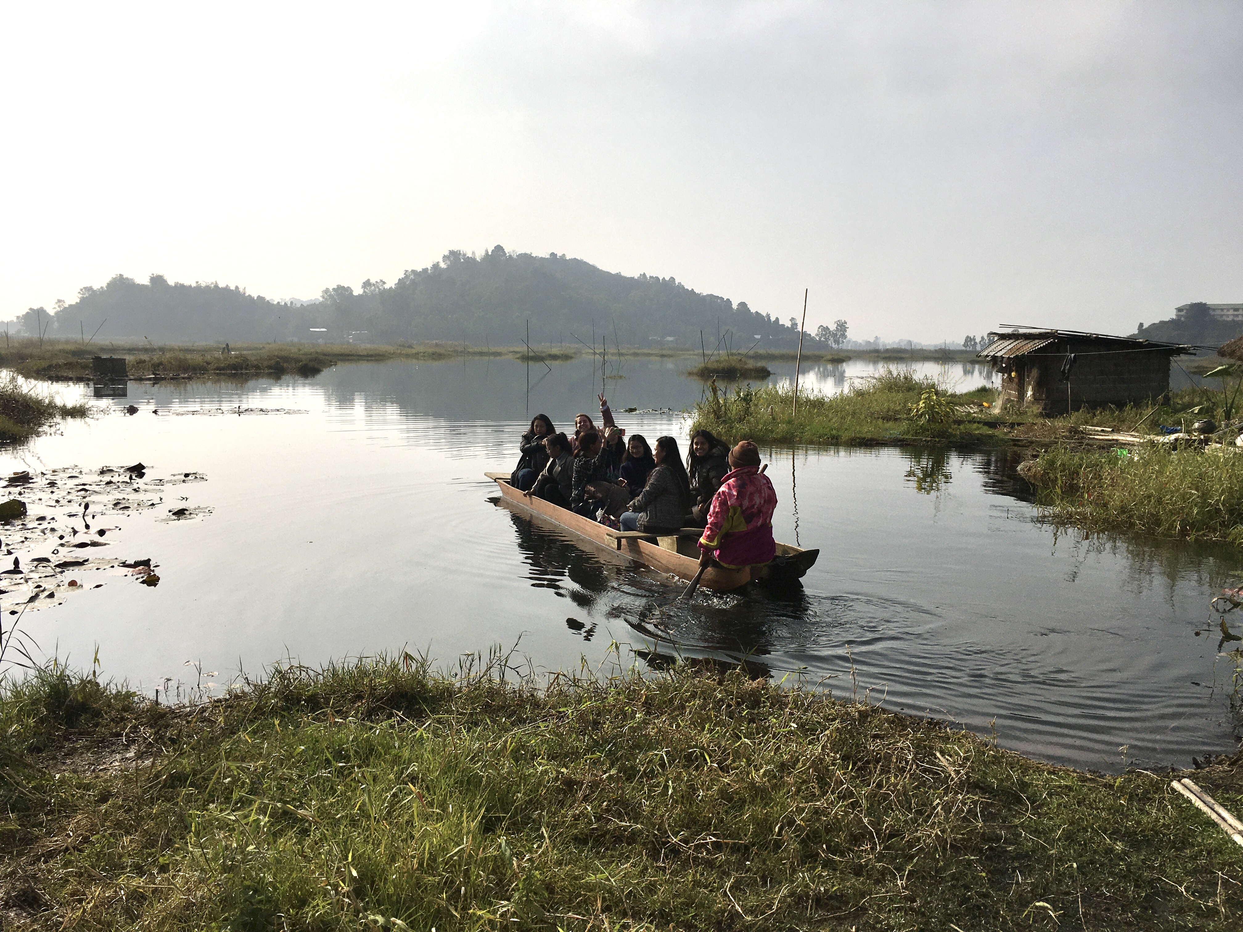 Dug-out canoe ride to and from the floating hut