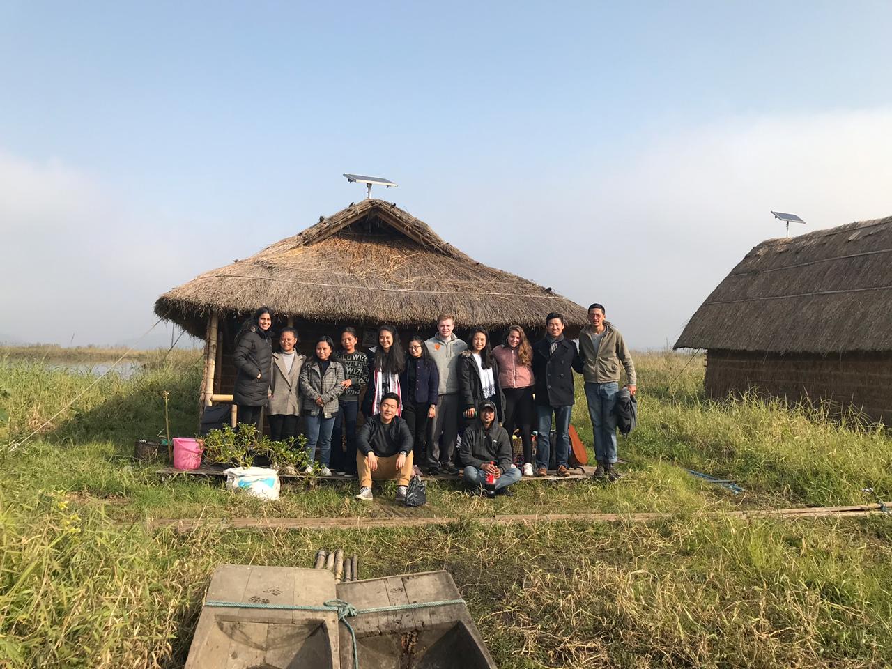 PSIL '20 team photo in front of floating hut